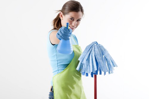 End of tenancy cleaning team preparing a quote for a compact apartment