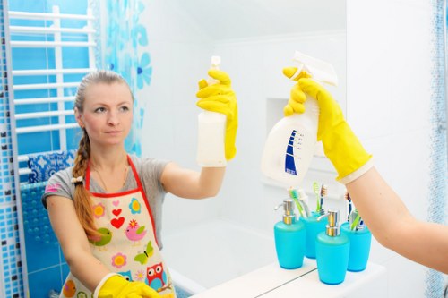 Cleaning team sorting recyclable materials during an end of tenancy house cleaning job