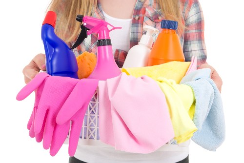 Professional cleaners using safe methods during an end of tenancy cleaning service