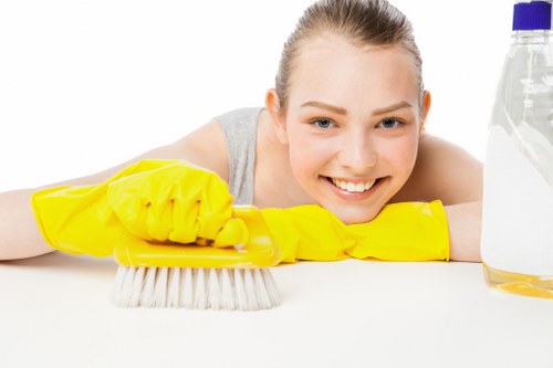 Office cleaner in London maintaining a clean workplace